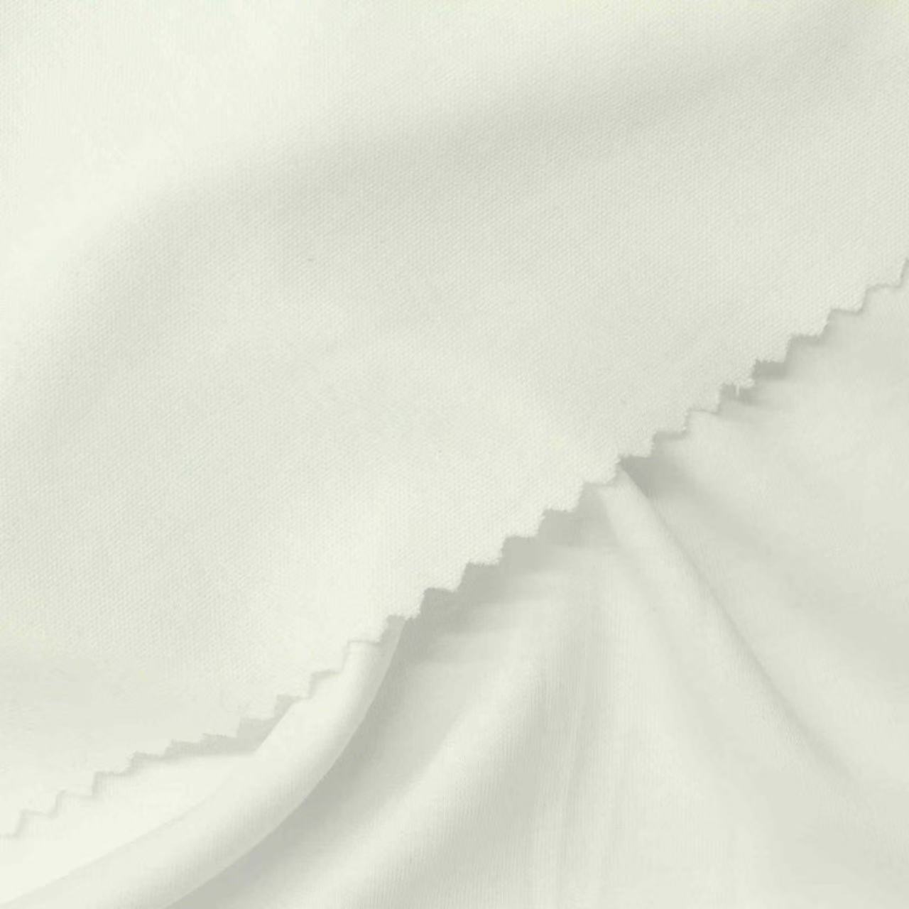 Nahaufnahme der Textur des mit flüssigem Ammoniak behandelten 60S-Baumwoll-Spandex-Interlock-Stoffs
