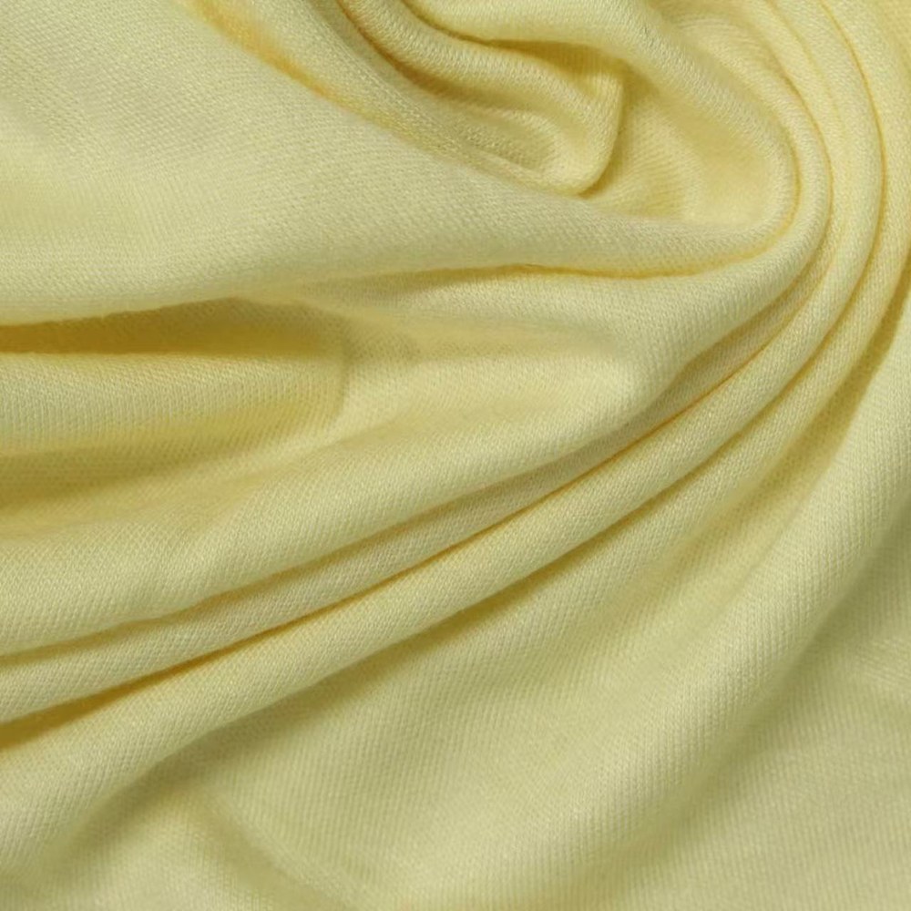 Soft yellow bamboo organic cotton interlock fabric