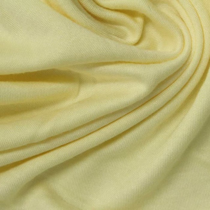 Soft yellow bamboo organic cotton interlock fabric
