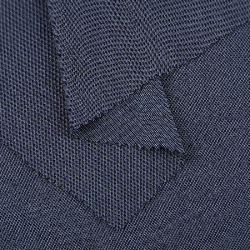 Detalle de textura de piqué modal lavado con arena